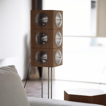 Wooden floor lamp with circular design in a room setting