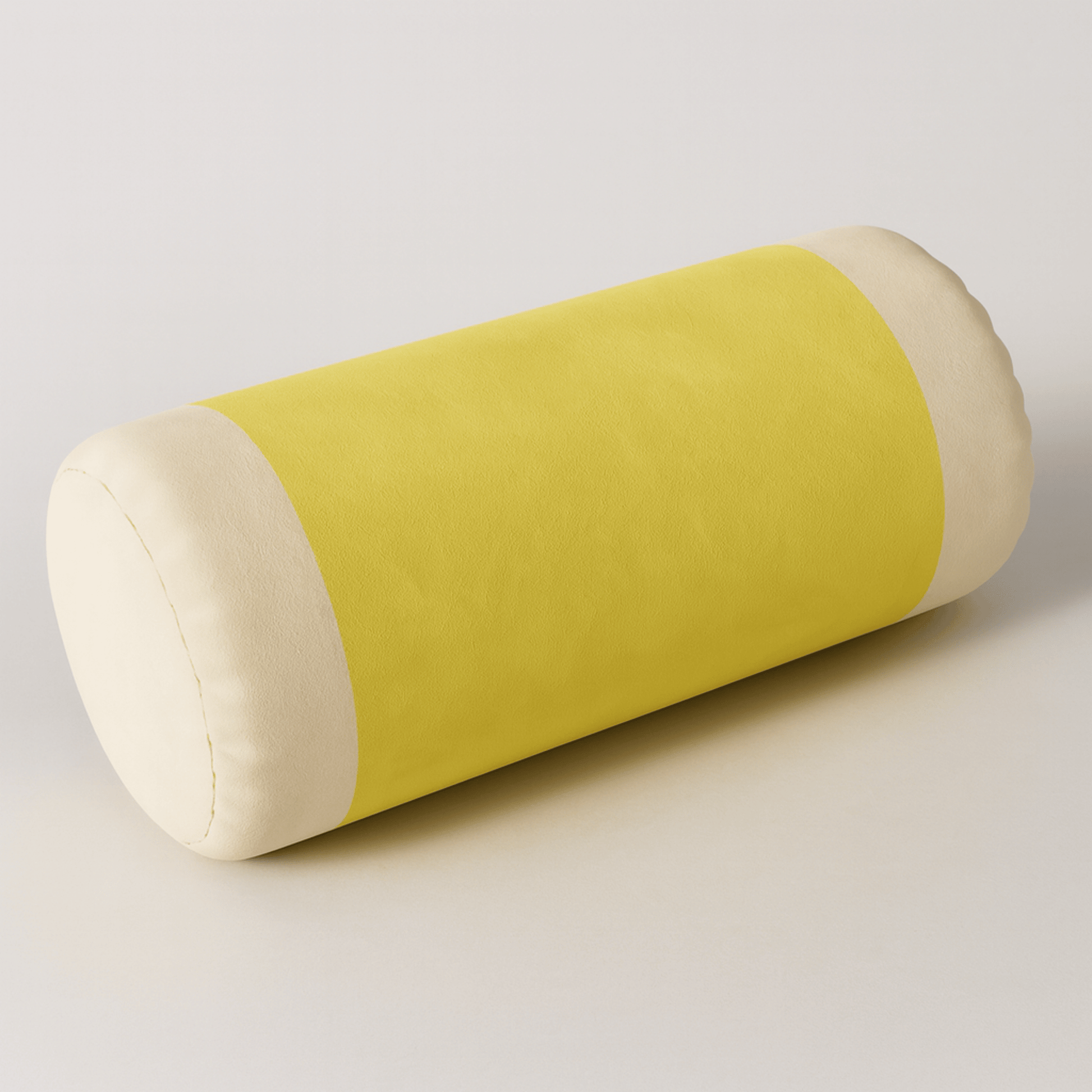 Yellow cylindrical pillow with white ends on a light gray background