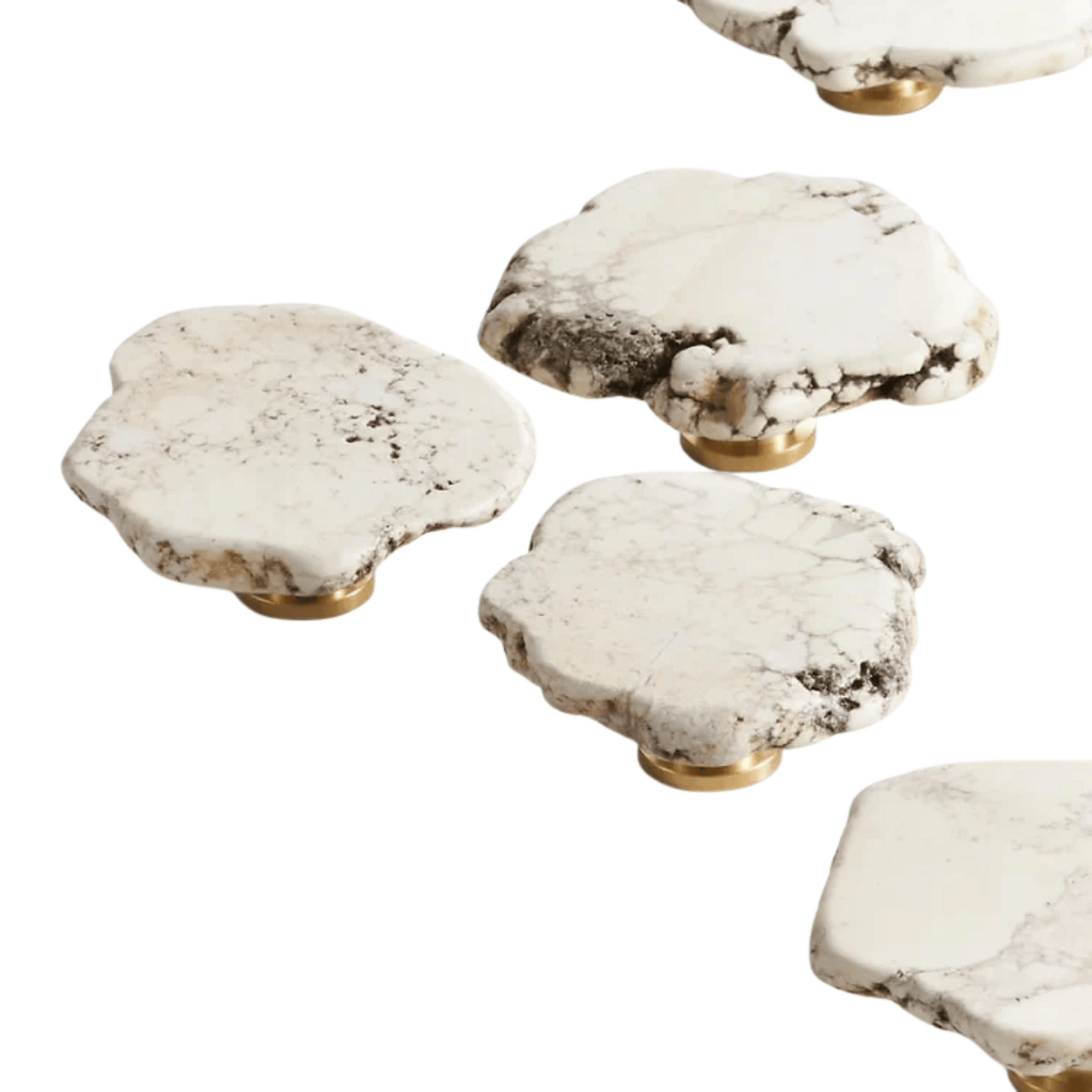 Set of five marble-patterned coasters with gold bases on a white background