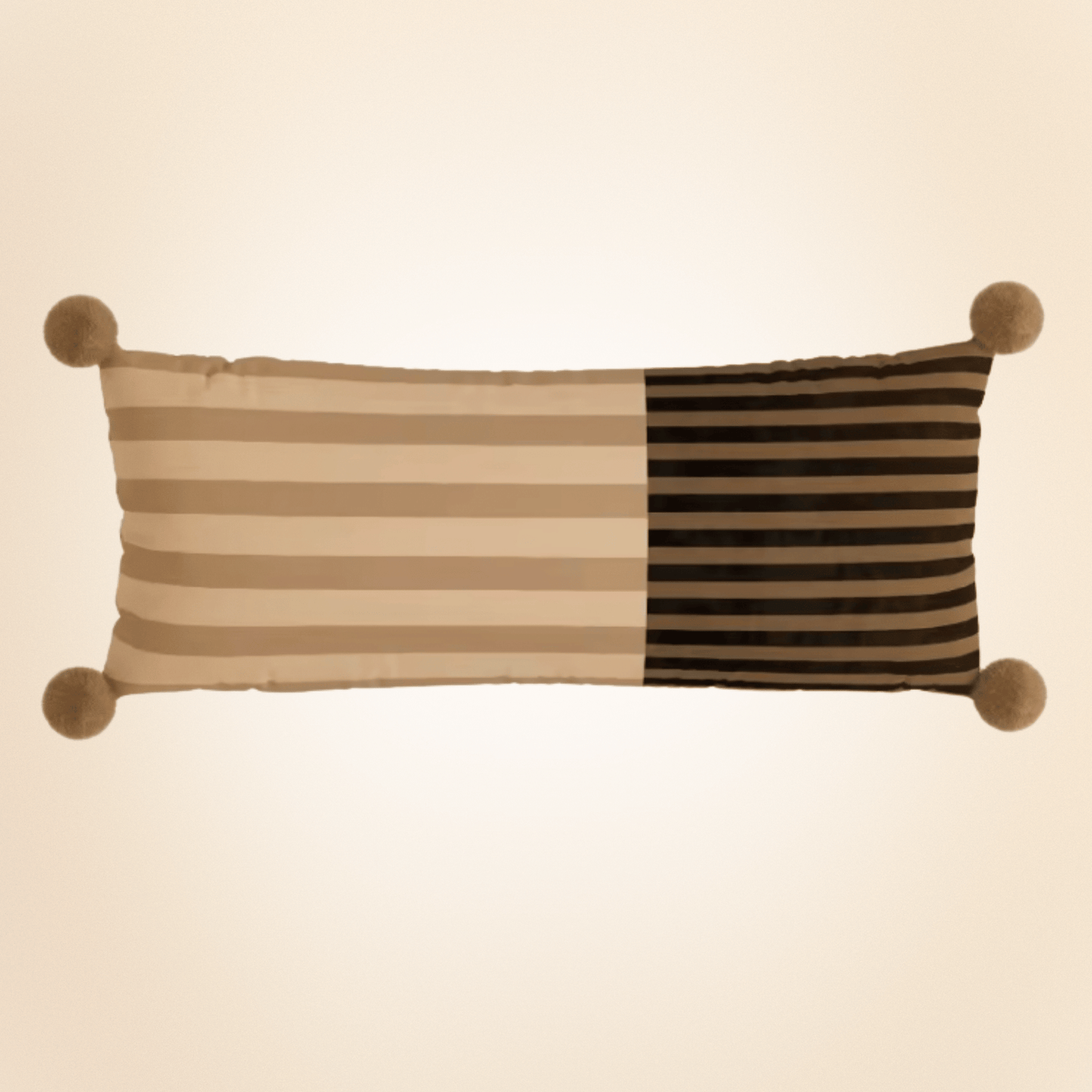 Decorative pillow with striped pattern and pom-pom accents on a beige background
