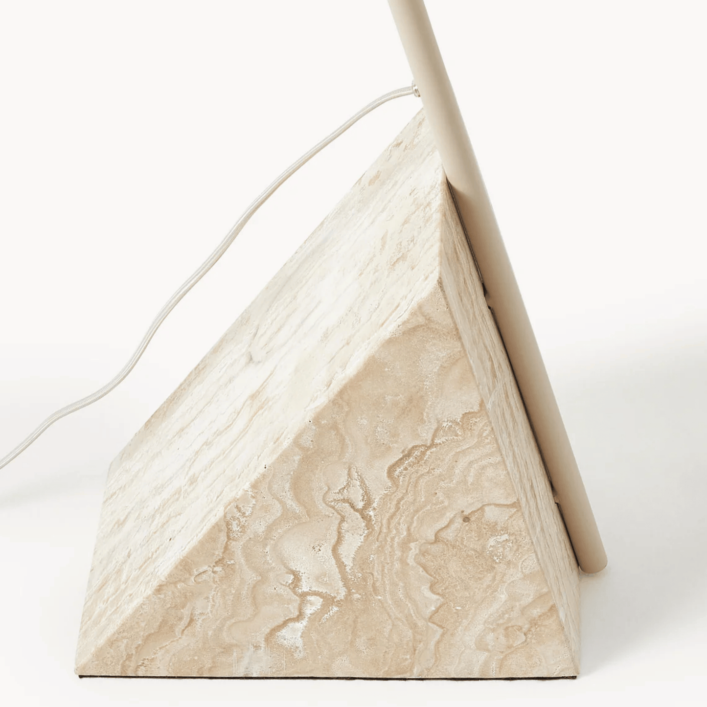 Triangular marble lamp on a white background