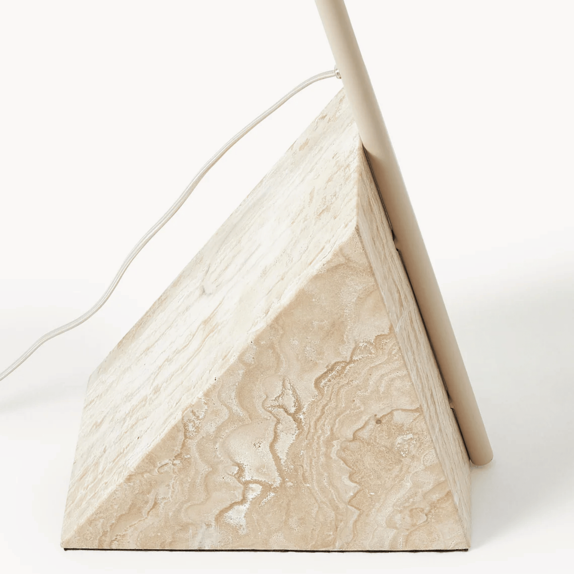 Triangular marble lamp on a white background