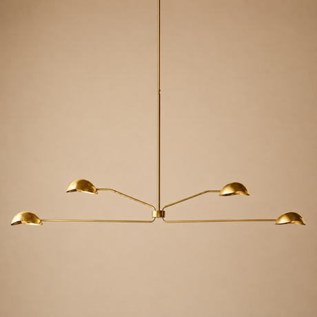 Gold pendant light fixture on a beige background