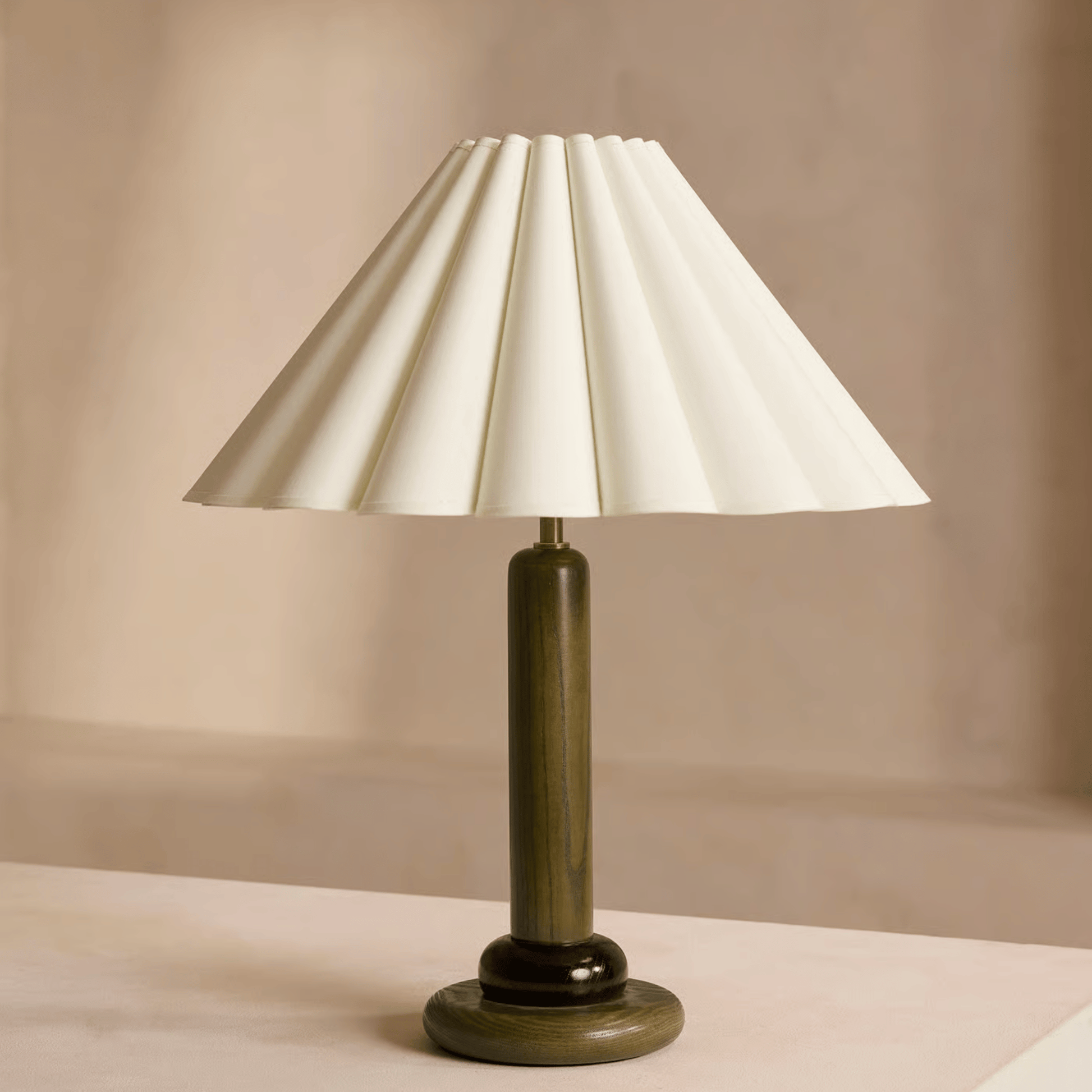 Table lamp with a white shade on a beige background