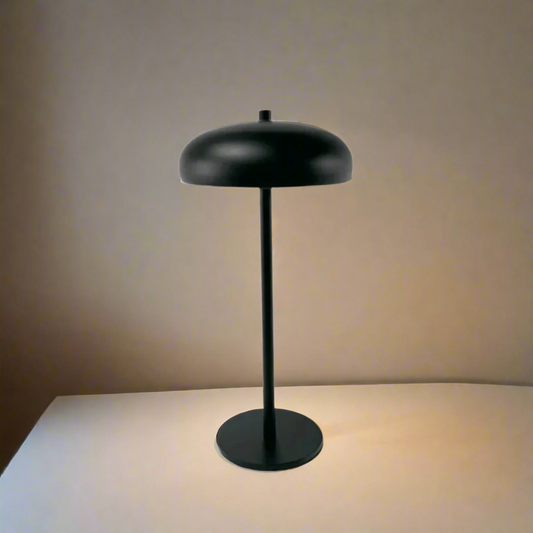 Black floor lamp with a minimalist design on a white background