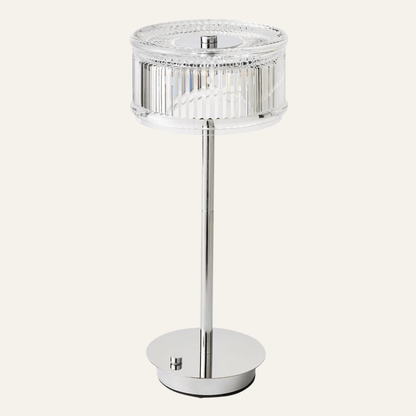Decorative table lamp with crystal accents on a white background