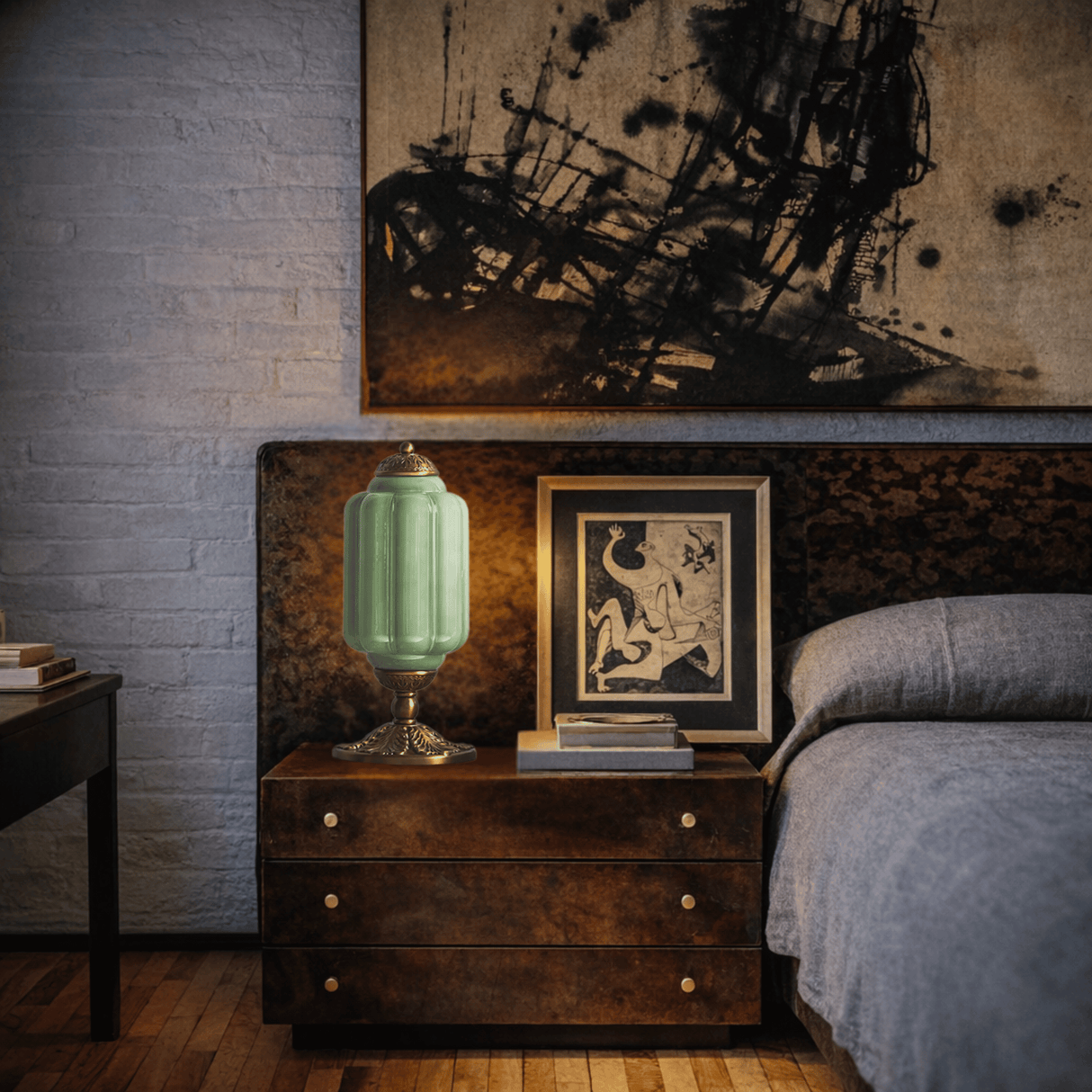 Napoleon III style bedroom with dark wood dresser, green lamp, and abstract painting.