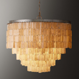 Chandelier with tiered design on a gray background