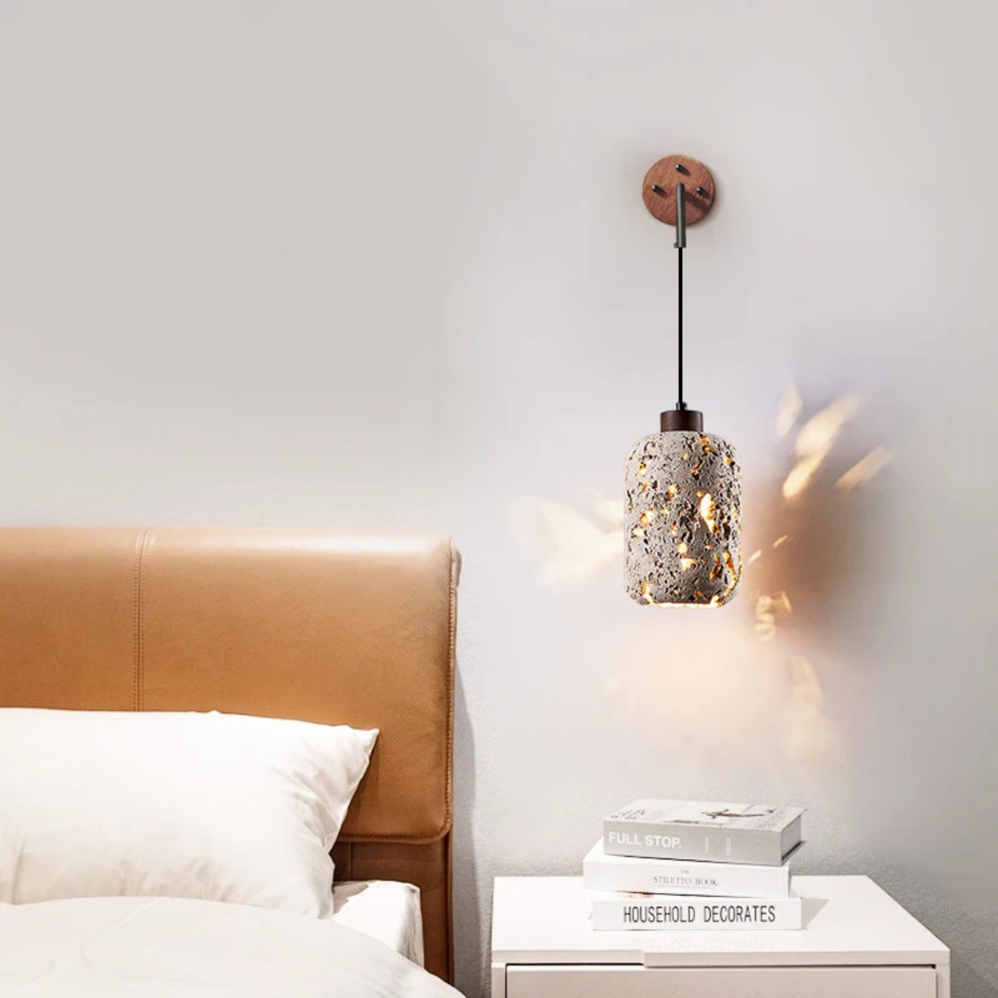 A similar bedside setup showing the lamp’s golden light illuminating the corner softly.