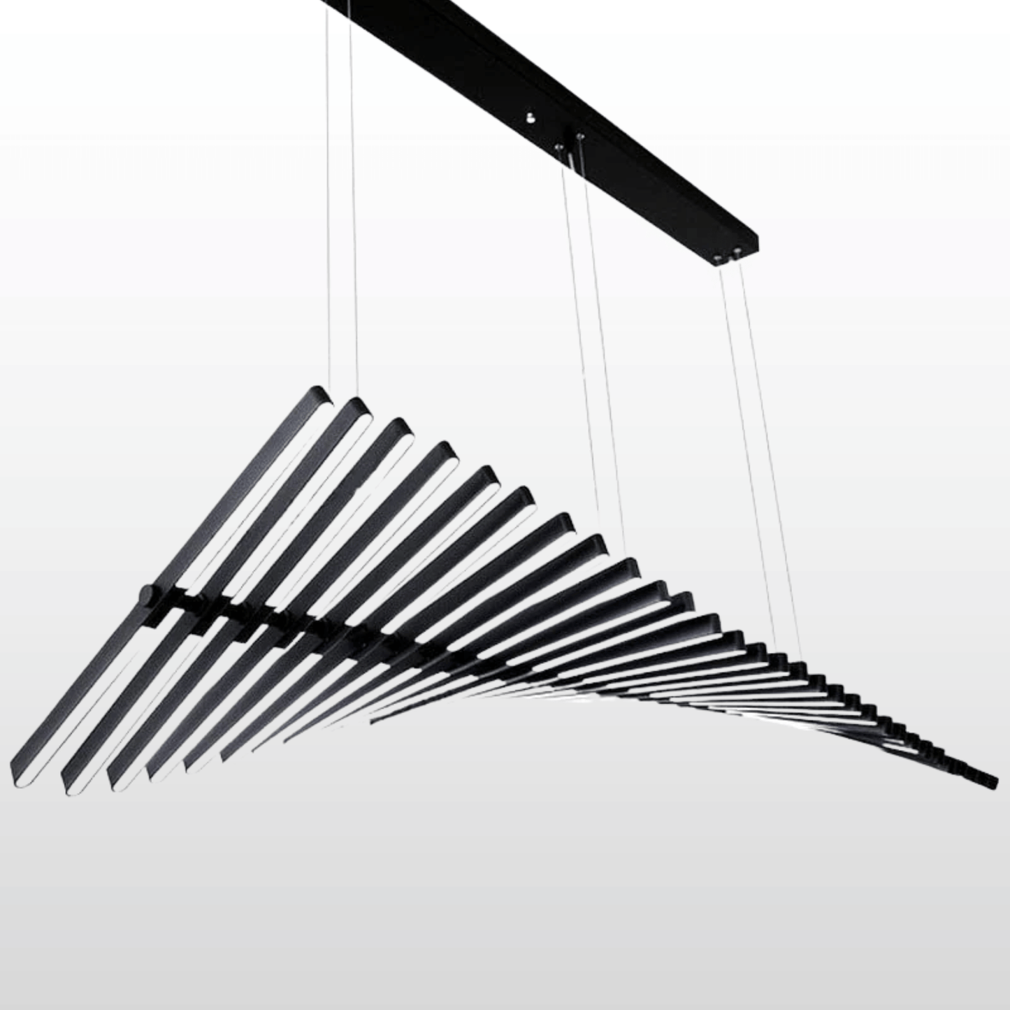 Black metal hanging sculpture on a white background