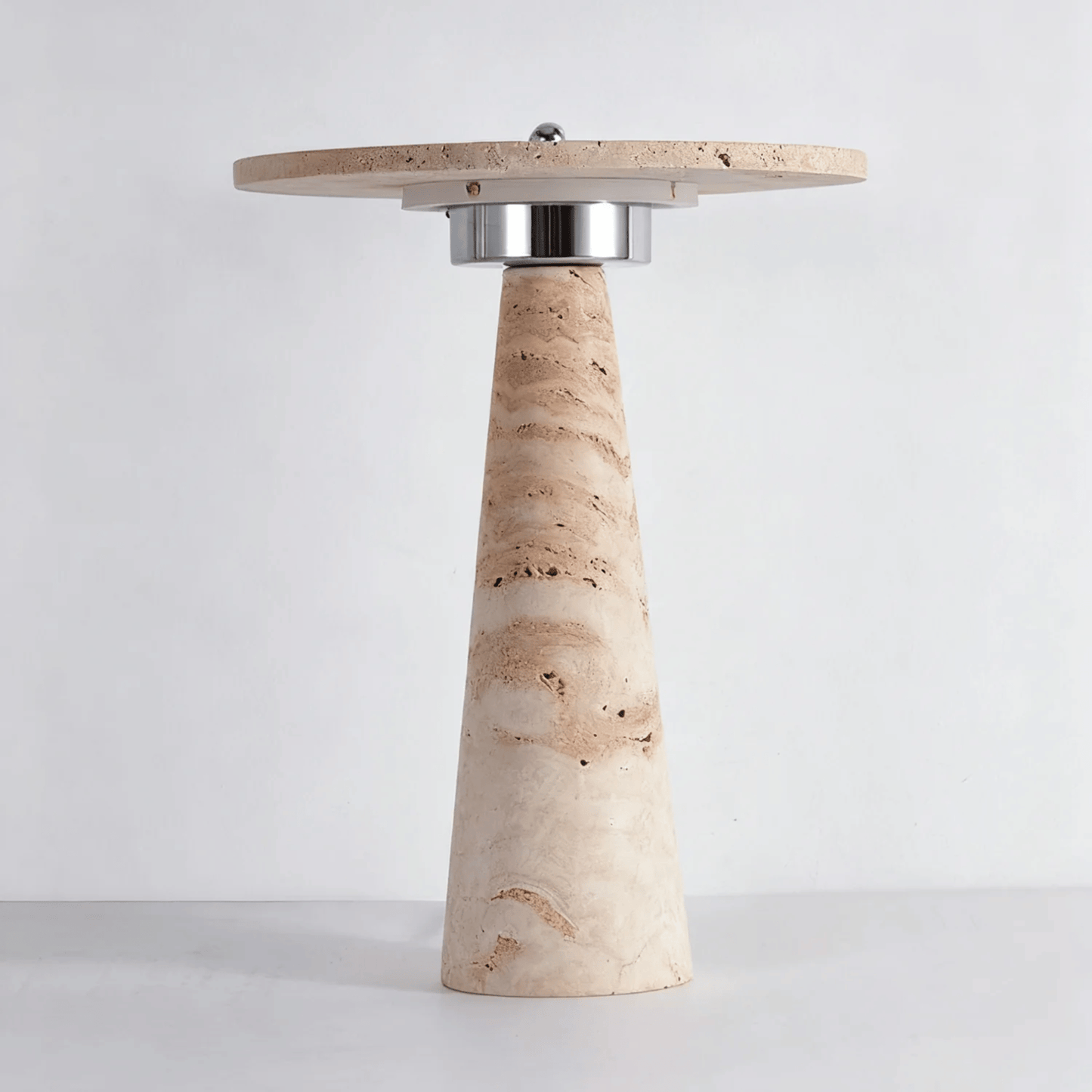 Decorative table with a conical marble base and round wooden top on a white background