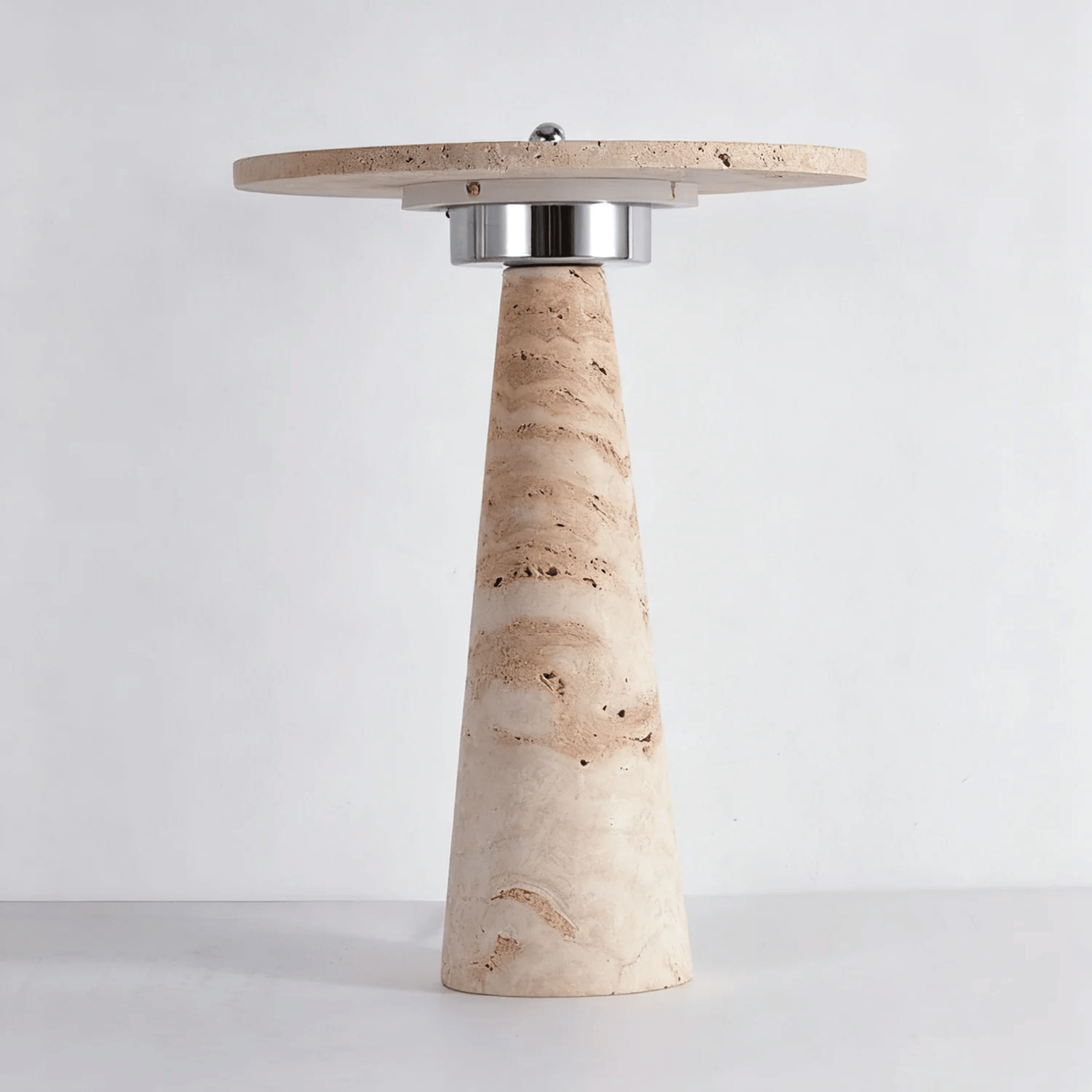Decorative table with a conical marble base and round wooden top on a white background