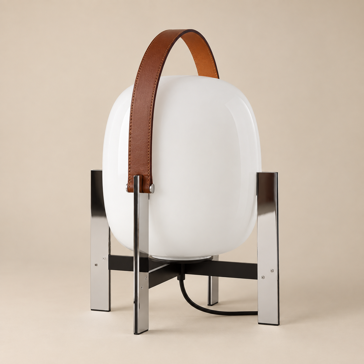 A modern table lamp with a glossy white oval shade, a brown leather top handle, and a polished silver metal stand, set against a solid beige background.