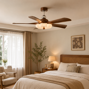 Bedroom with a ceiling fan, bed, lamp, and decor