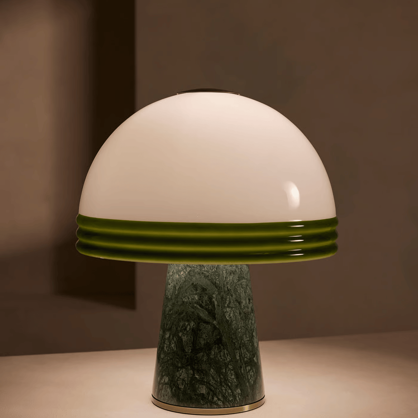 Mushroom-shaped lamp with white top and green base on a neutral background