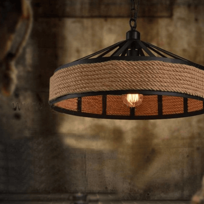 Pendant light with rope design against a rustic background