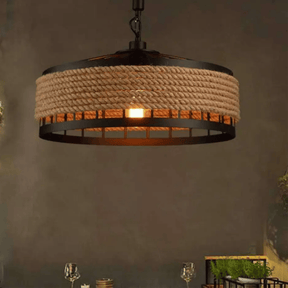 Rustic pendant light with woven design on a dark background