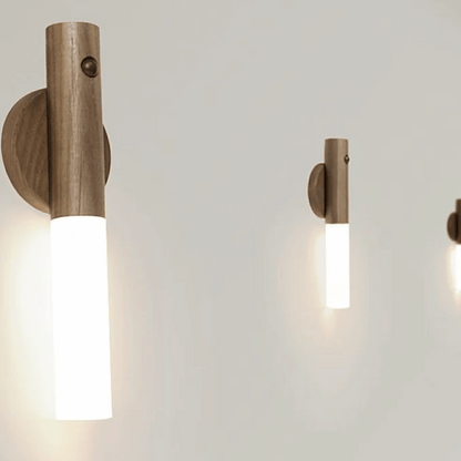 Wooden wall sconces on a light gray wall