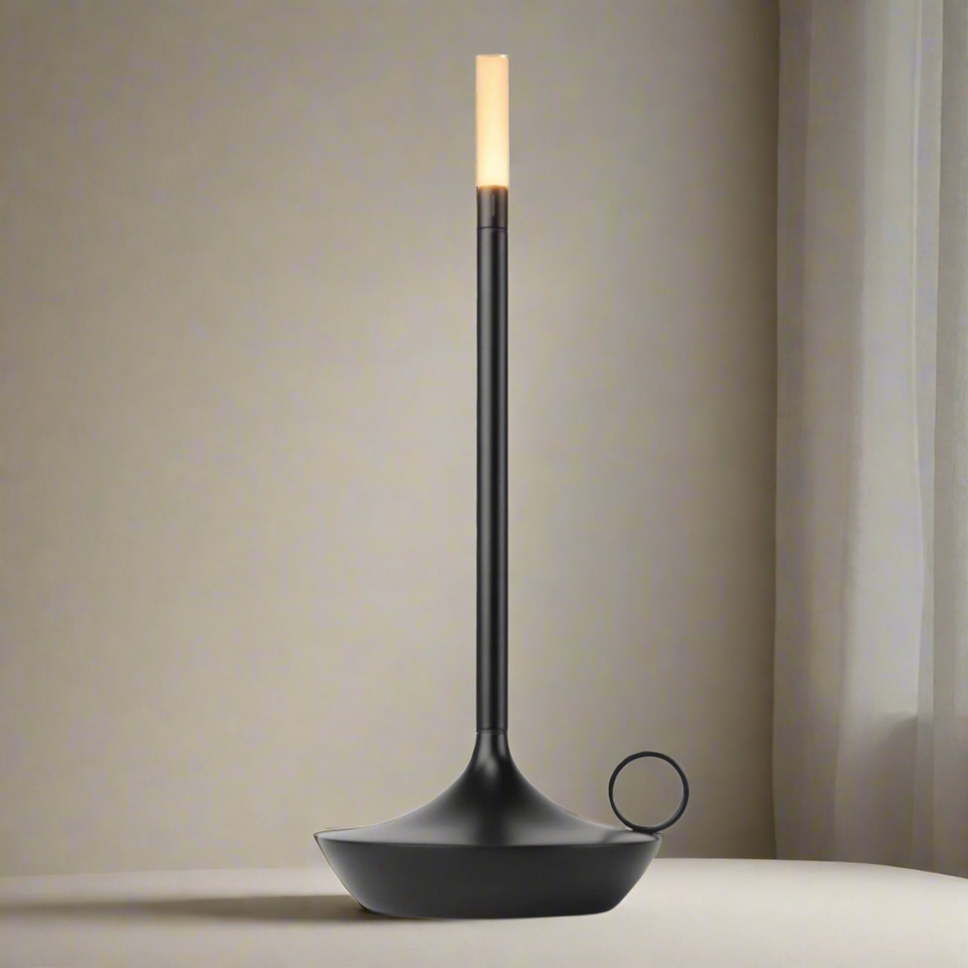 Black floor lamp with a white bulb on a white background