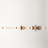 Modern pendant light with geometric design on a white background