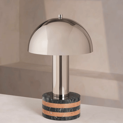 Table lamp with marble base on a neutral background