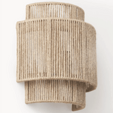 Beige woven wall light fixture on a white background