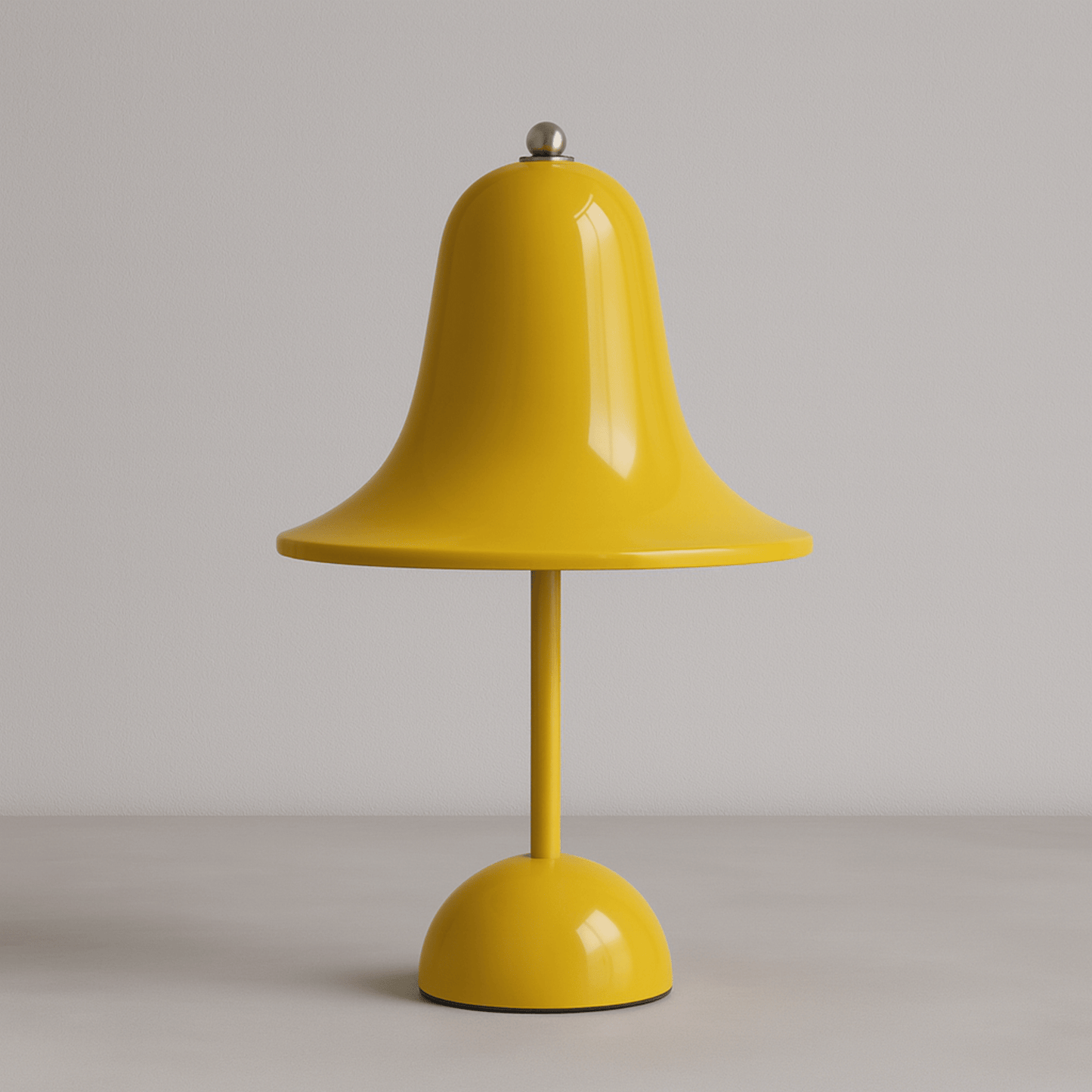 Yellow bell-shaped lamp on a plain background