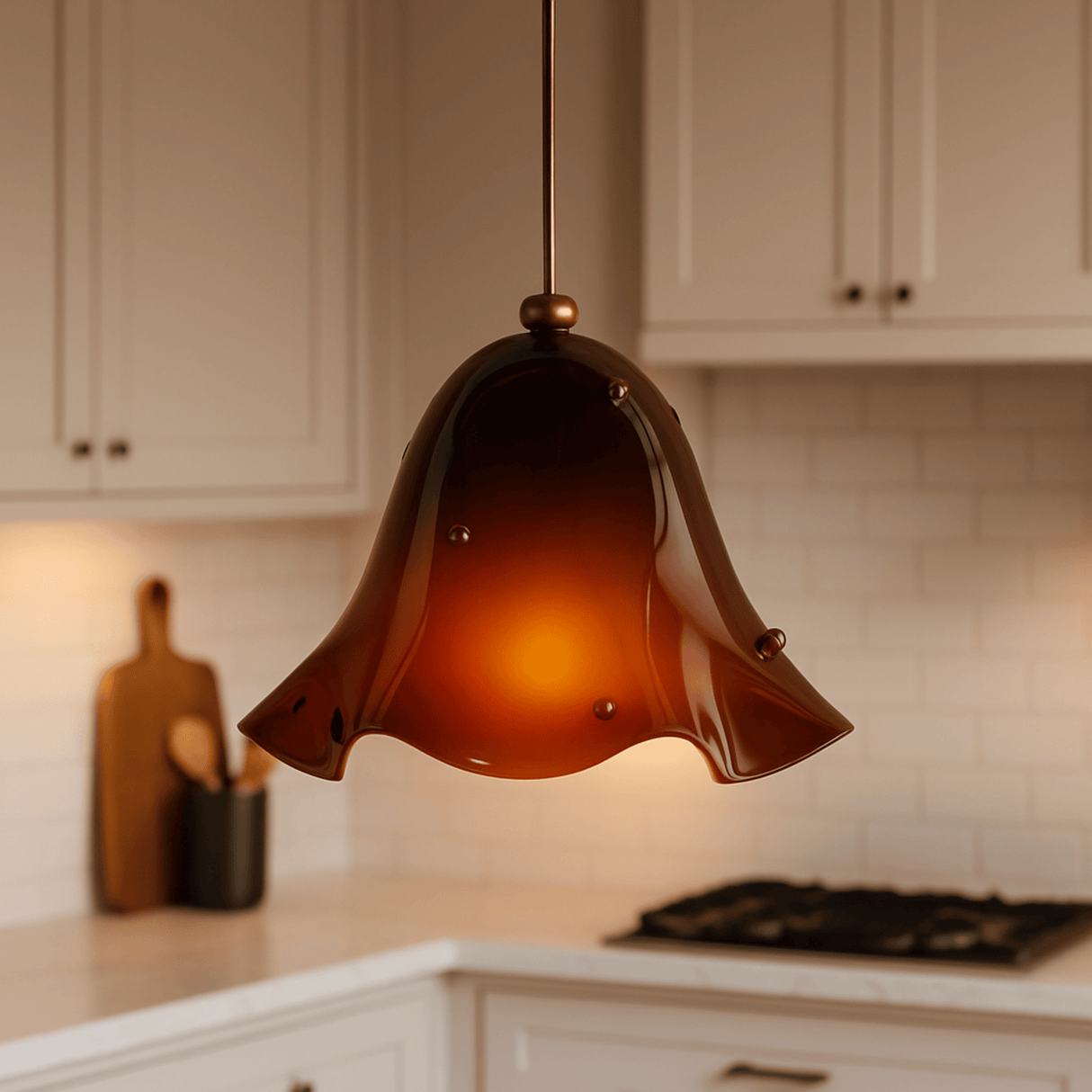 Amber glass pendant light hanging in a kitchen setting
