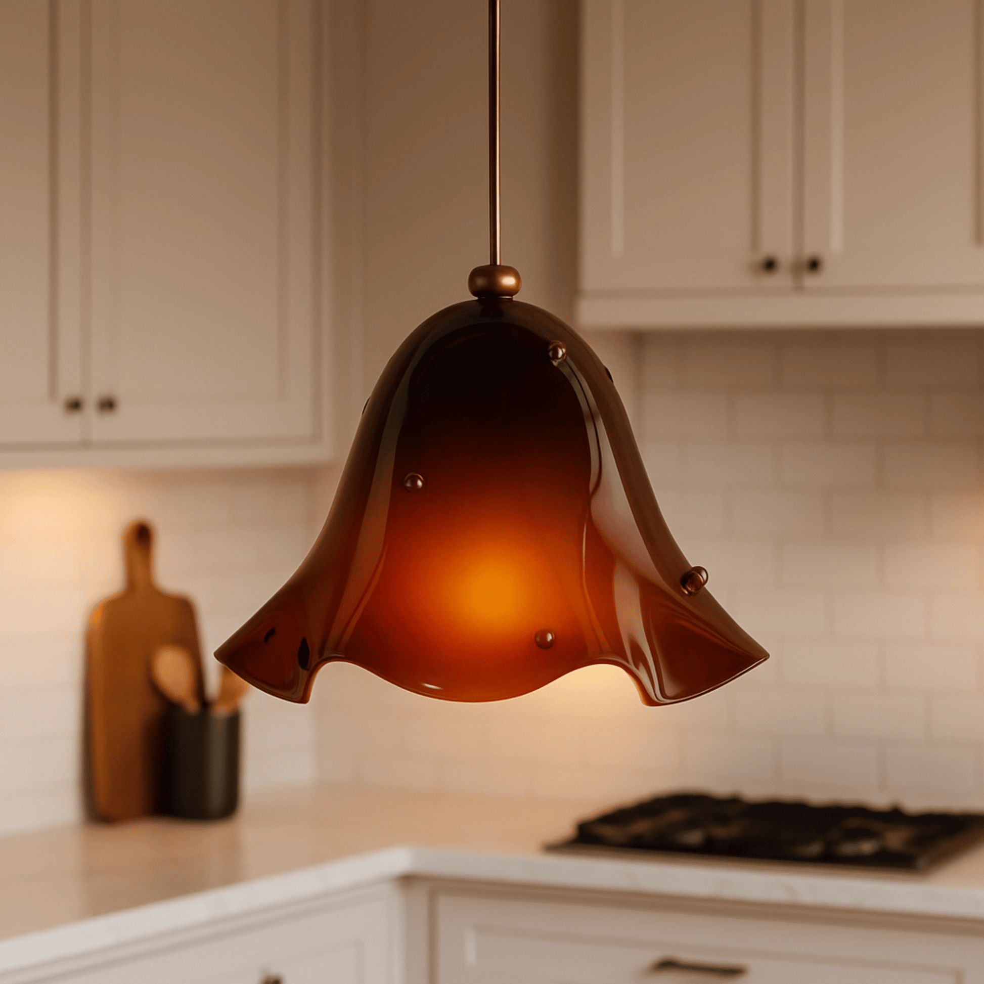 Amber glass pendant light hanging in a kitchen setting
