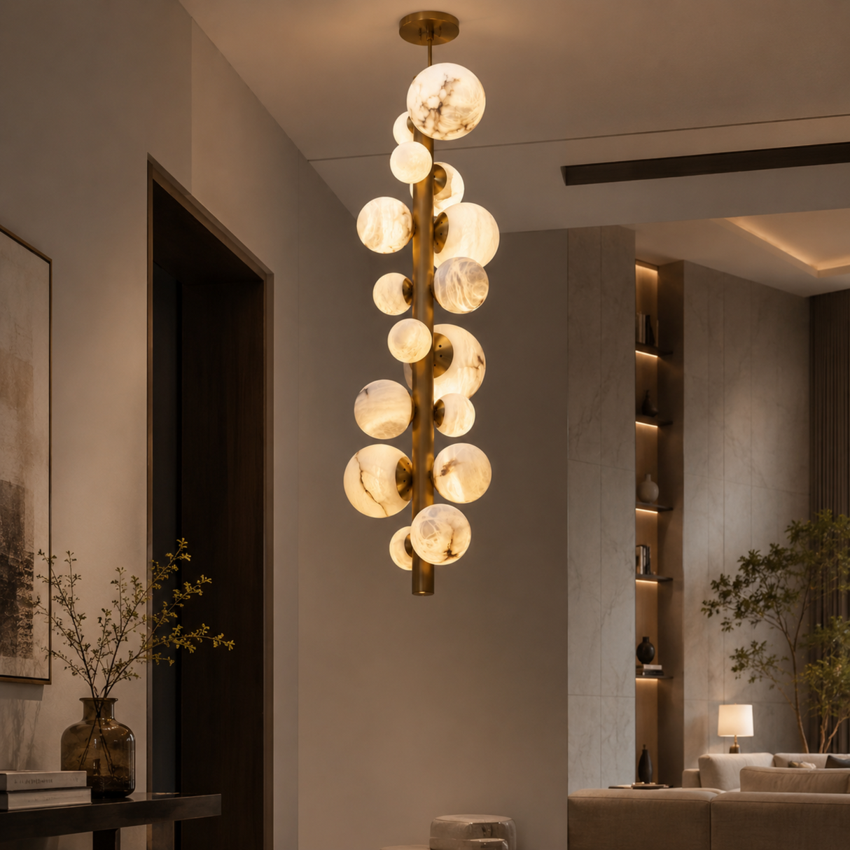 Modern chandelier hanging in a living room with neutral decor