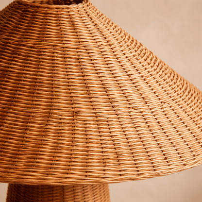 Close-up of a wicker lampshade on a beige background