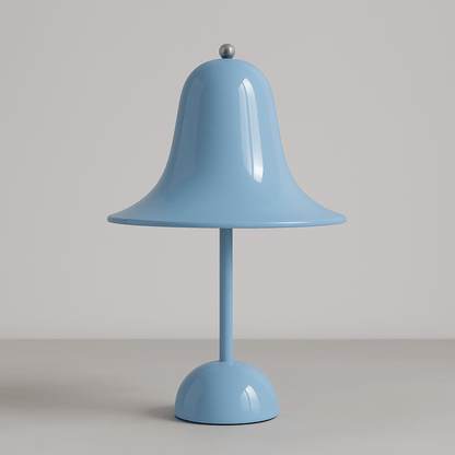 Blue table lamp with a bell-shaped shade on a gray background