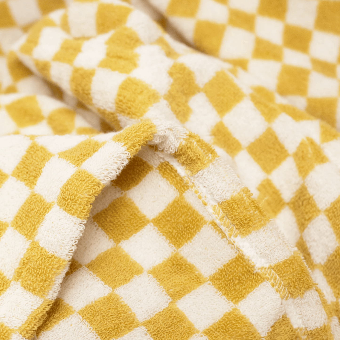 Close-up of a yellow and white checkered fabric