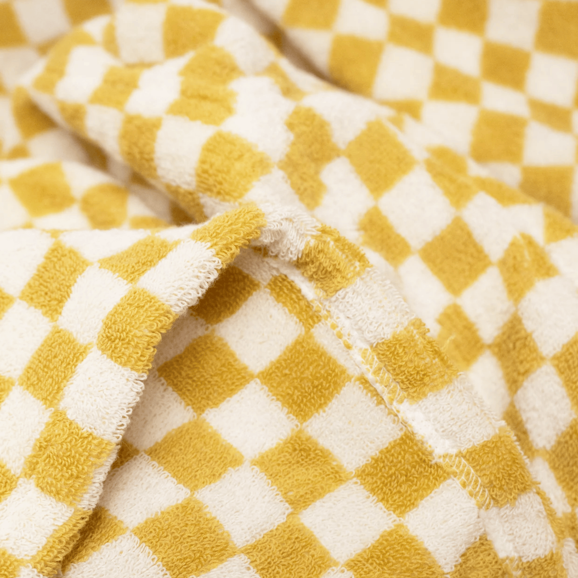 Close-up of a yellow and white checkered fabric