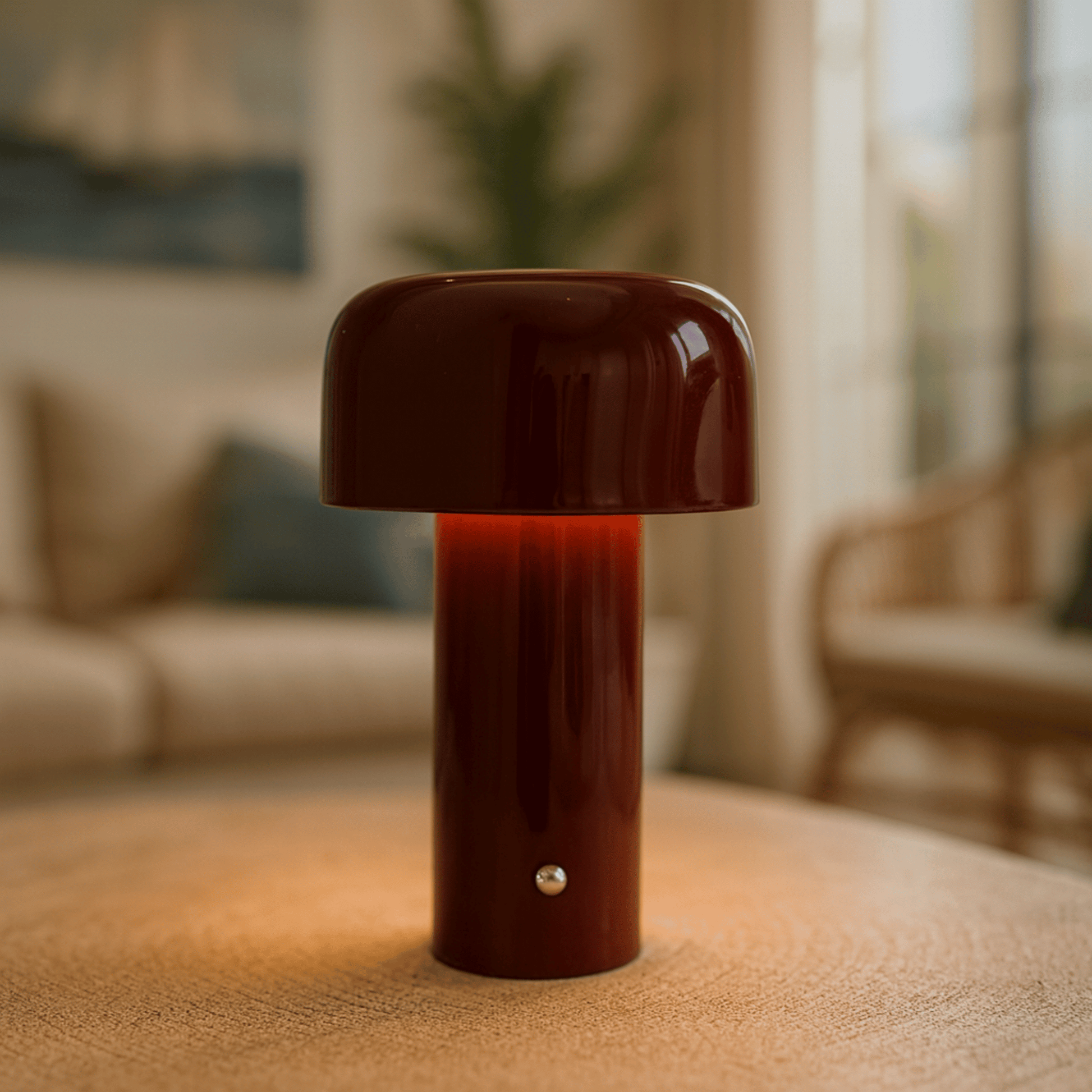 Mushroom-shaped lamp on a textured surface with a blurred indoor background