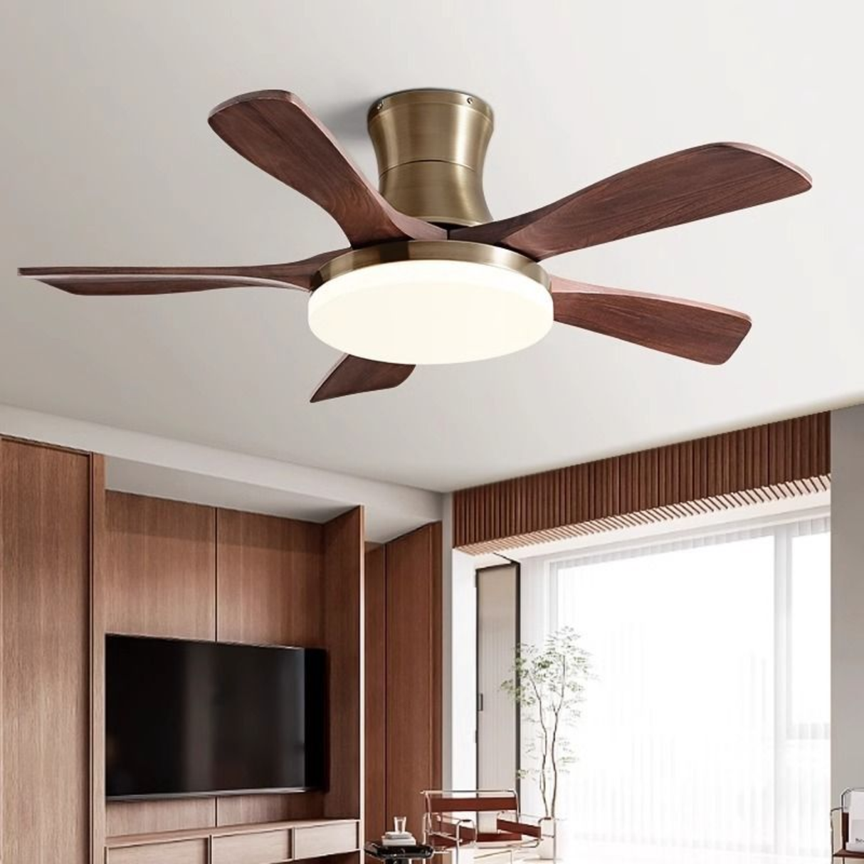Ceiling fan with wooden blades and light fixture in a modern living room.