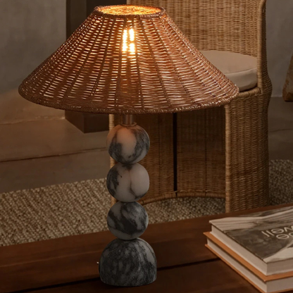 Lamp glowing warmly on a wooden table in a dimly lit room, creating a cozy, ambient effect.