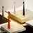 Modern table lamps on a marble surface with a neutral background