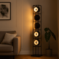 Tall floor lamp with multiple light fixtures in a living room setting.