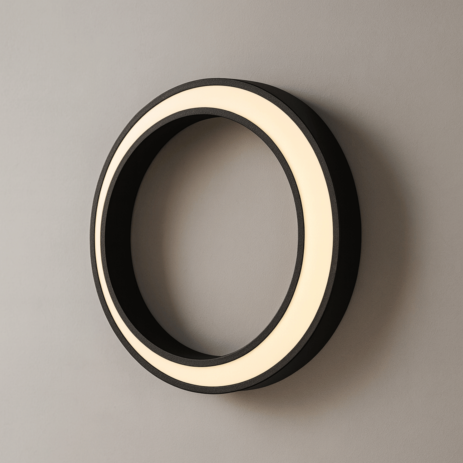 Round wall light fixture with black frame and white interior on a gray background