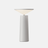 White table lamp on a gray backround