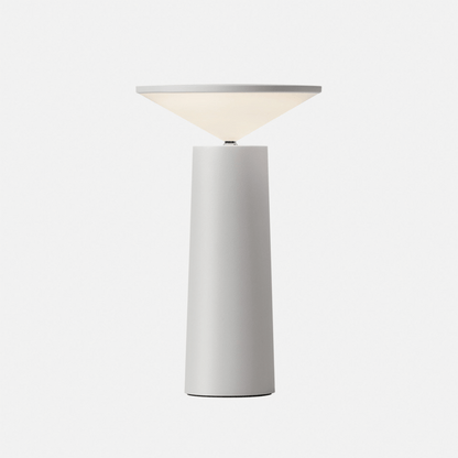 White table lamp on a gray backround
