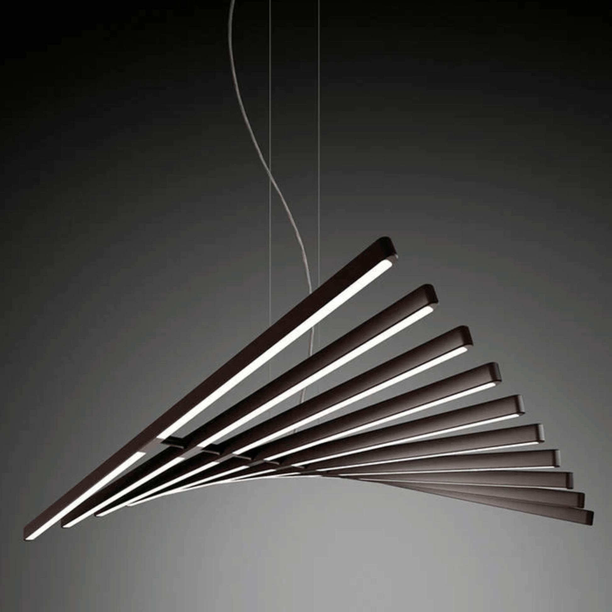 Modern pendant light with multiple horizontal bars on a dark background