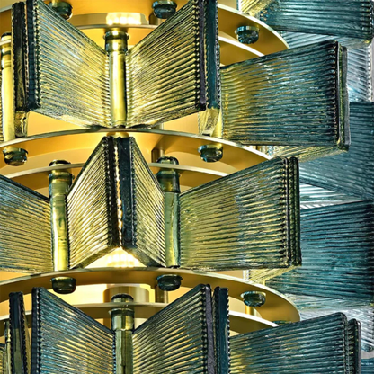 Contemporary living space featuring a row of blue-tinted glass wall lights adding a stylish decorative glow.