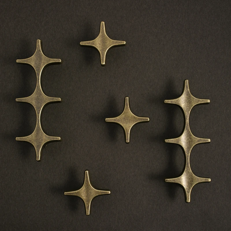 Set of bronze decorative elements on a dark background