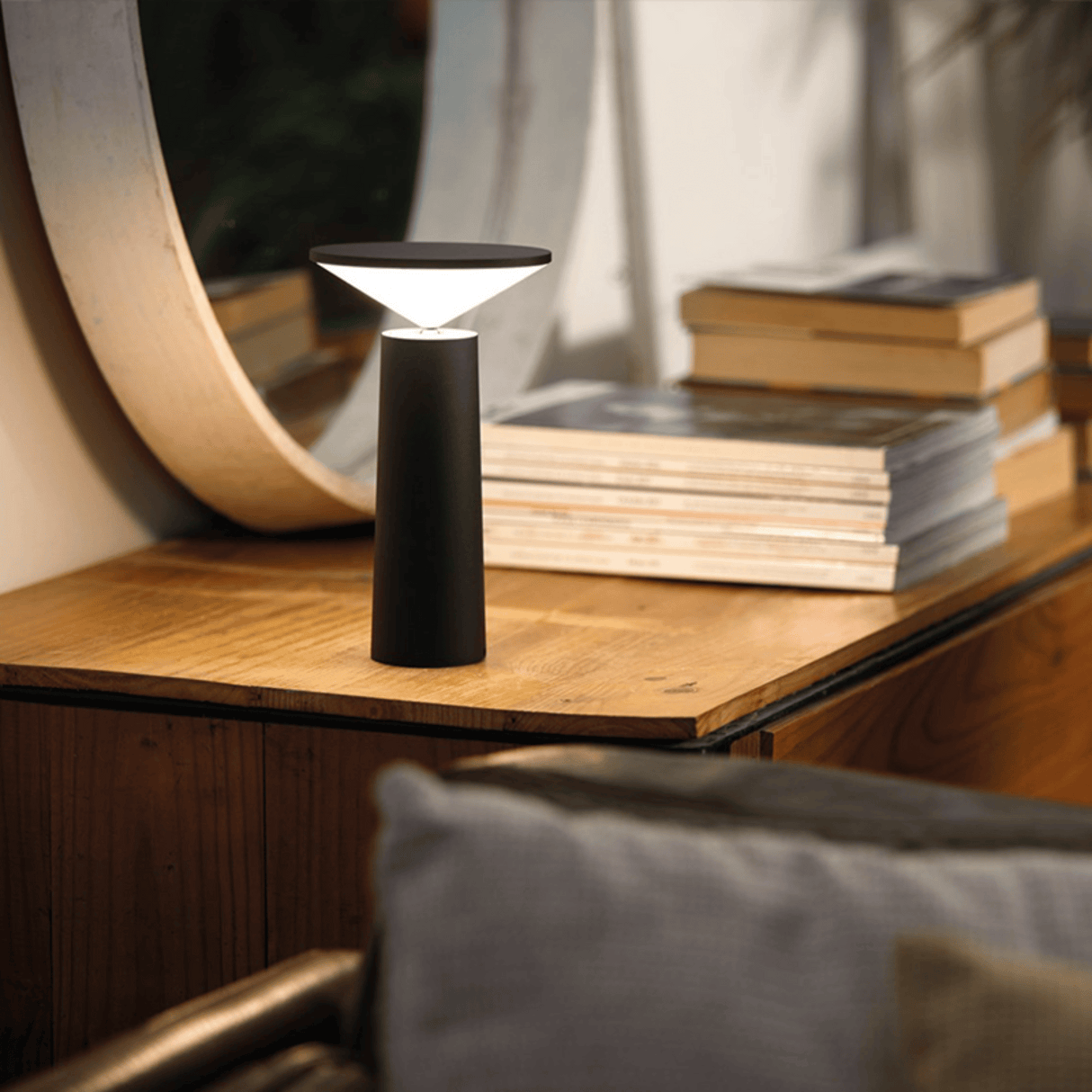 Black table lamp on a console