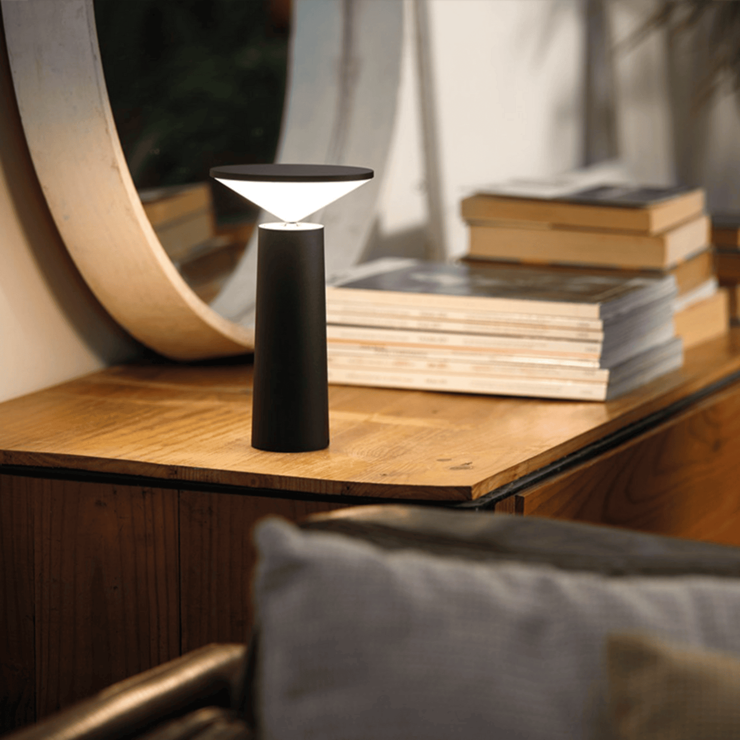 Black table lamp on a console 