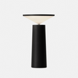 Black table lamp on a gray backround