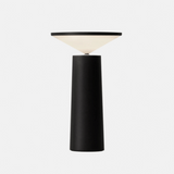 Black table lamp on a gray backround