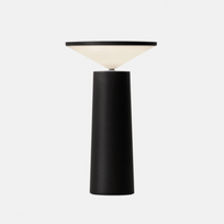 Black table lamp on a gray backround
